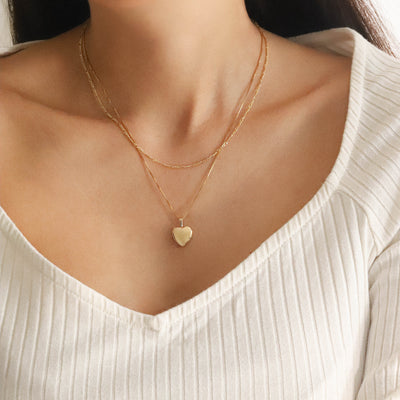 Gold heart locket necklace