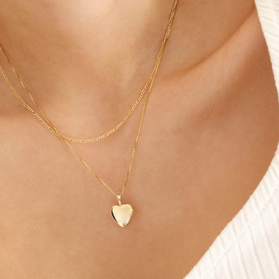 Gold heart pendant necklace