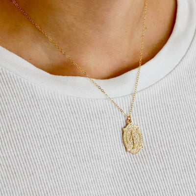 Gold virgin Mary necklace