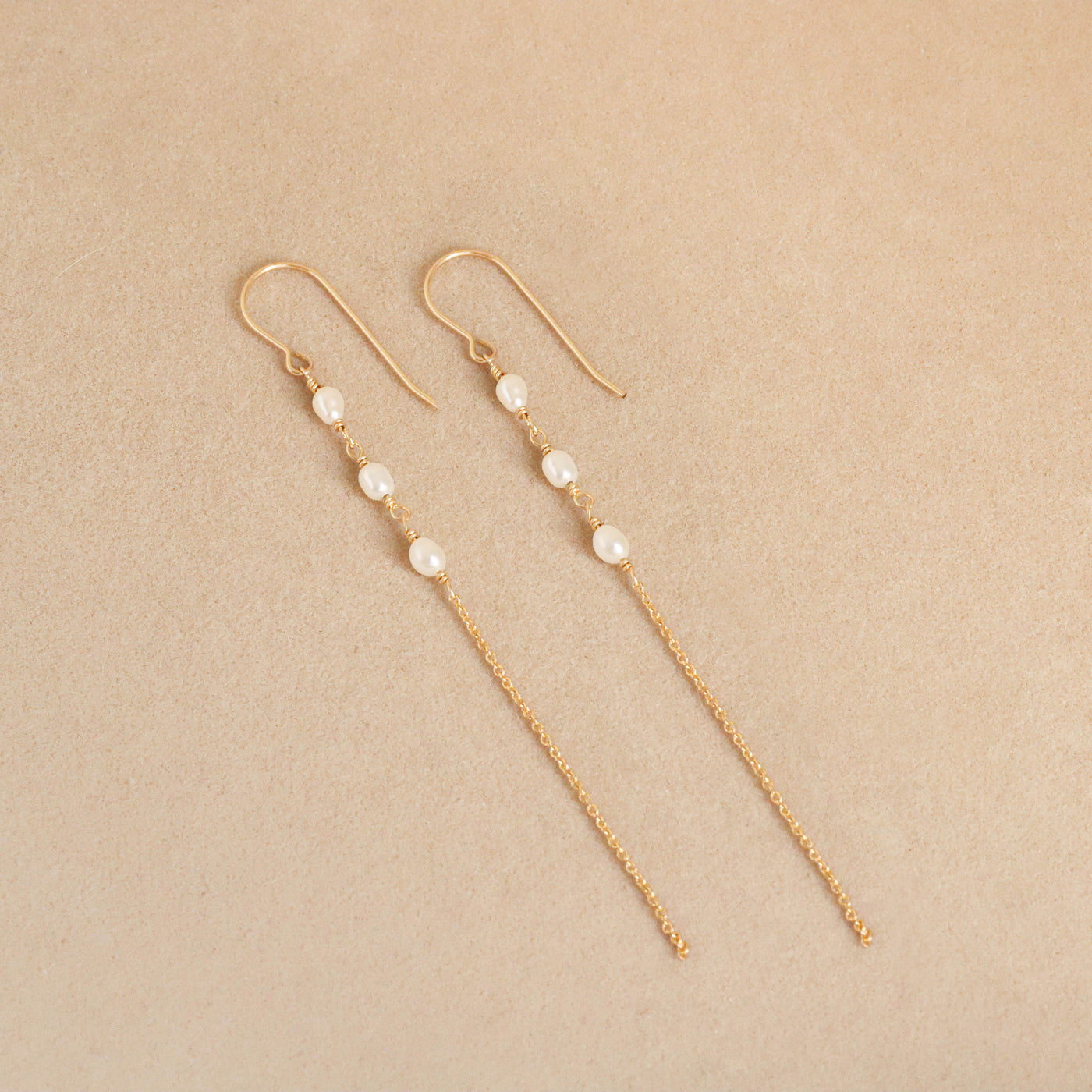 Long pearl earrings